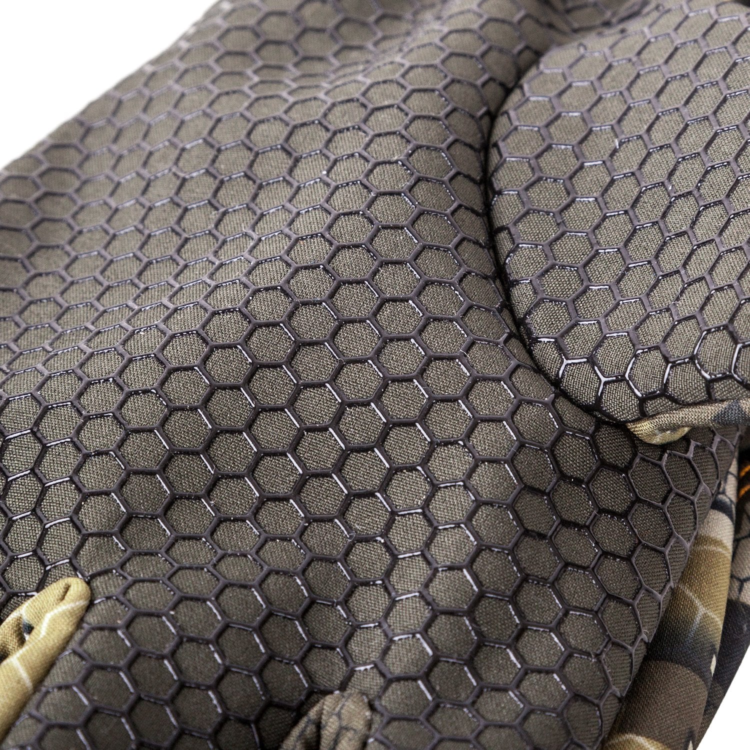 A pair of camouflage fingerless crux gloves with silicone grip print and branding on the back of the hand.
